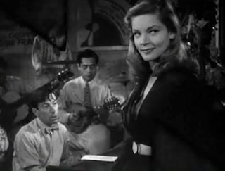 Lauren_Bacall_with_Hoagy_Carmichael_in_To_Have_and_Have_Not_Trailer